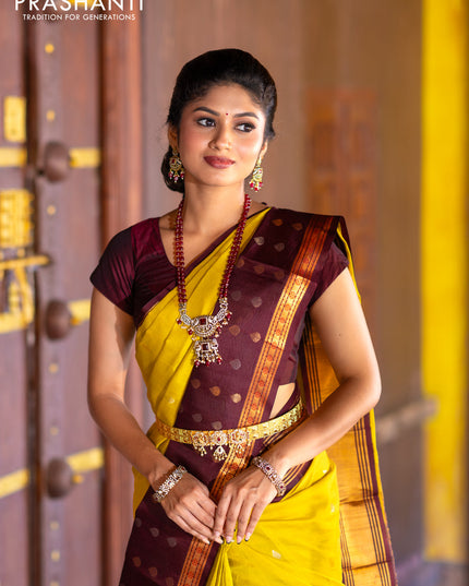 Kuppadam silk cotton saree lime yellow and deep maroon with silver & gold zari woven tilak buttas and temple design rettapet zari woven butta border