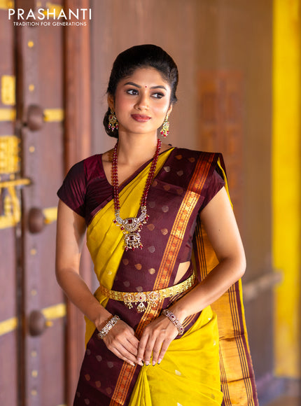 Kuppadam silk cotton saree lime yellow and deep maroon with silver & gold zari woven tilak buttas and temple design rettapet zari woven butta border