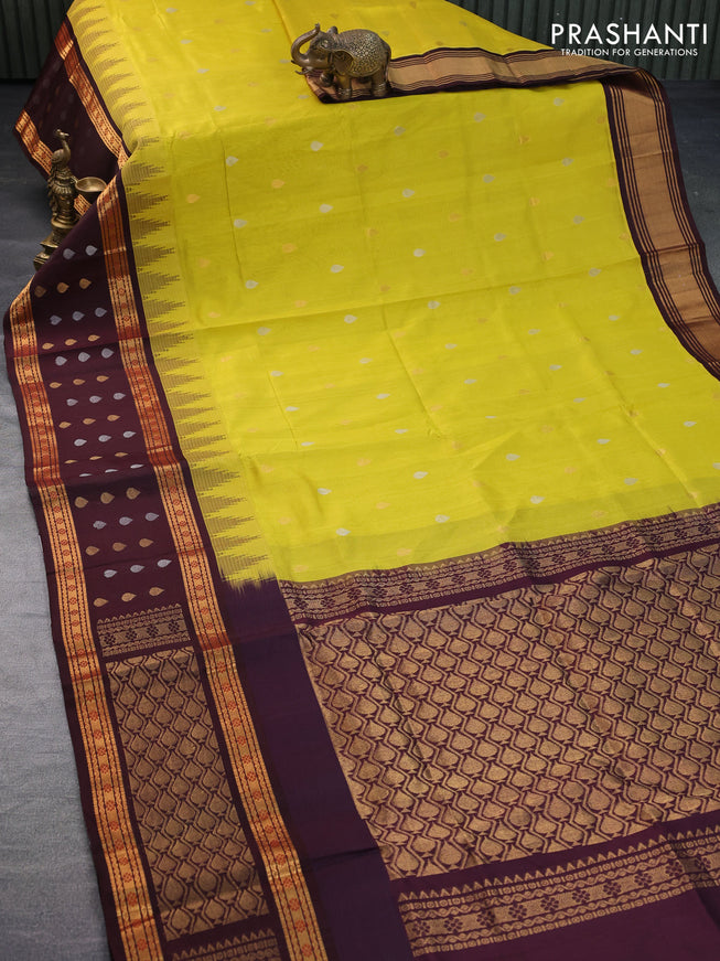 Kuppadam silk cotton saree lime yellow and deep maroon with silver & gold zari woven tilak buttas and temple design rettapet zari woven butta border