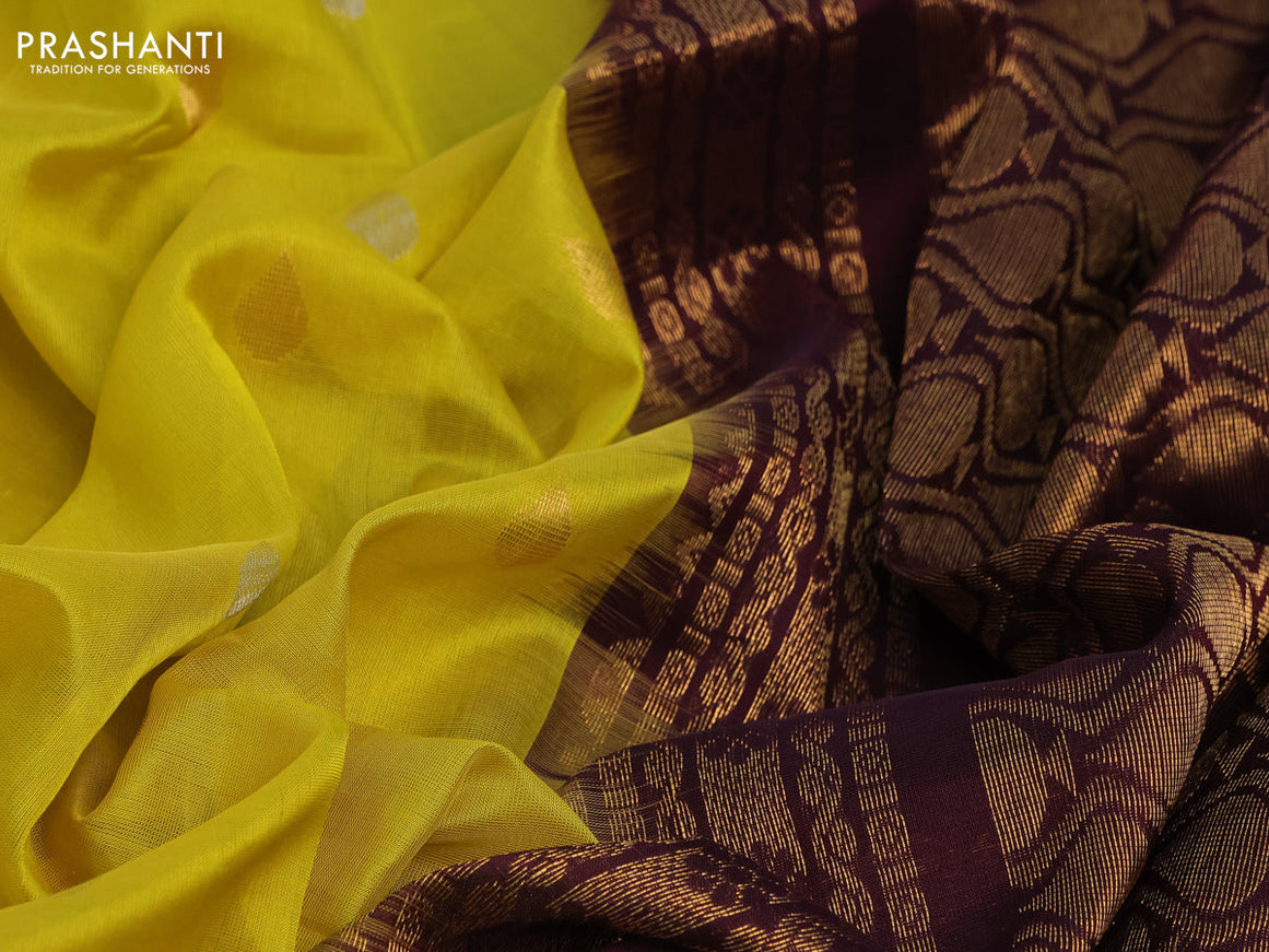 Kuppadam silk cotton saree lime yellow and deep maroon with silver & gold zari woven tilak buttas and temple design rettapet zari woven butta border