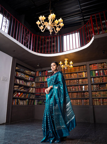 Banarasi poona silk saree peacock blue and red with allover silver zari woven stripes pattern and zari woven floral butta border