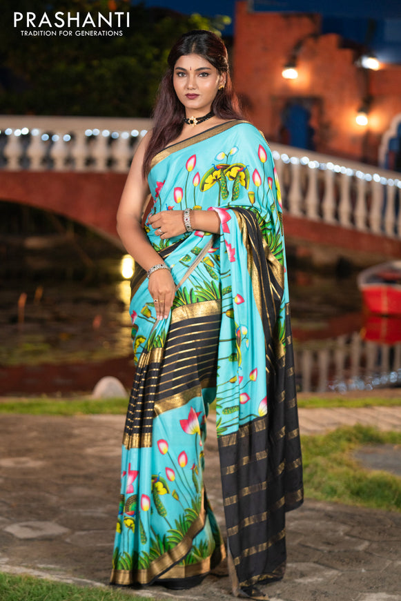 Pure mysore silk saree light blue and black with zari stripes pattern and long zari woven pichwai printed border