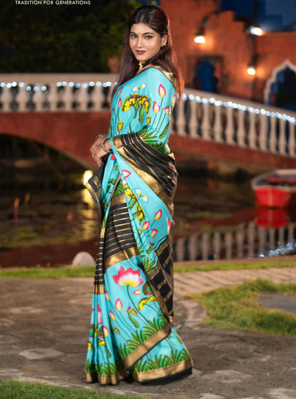 Pure mysore silk saree light blue and black with zari stripes pattern and long zari woven pichwai printed border