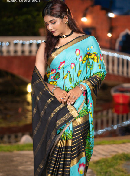 Pure mysore silk saree light blue and black with zari stripes pattern and long zari woven pichwai printed border