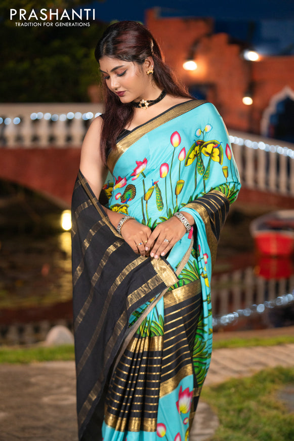 Pure mysore silk saree light blue and black with zari stripes pattern and long zari woven pichwai printed border