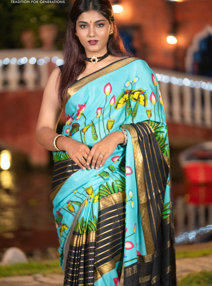 Pure mysore silk saree light blue and black with zari stripes pattern and long zari woven pichwai printed border