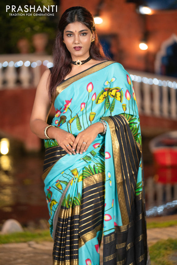 Pure mysore silk saree light blue and black with zari stripes pattern and long zari woven pichwai printed border