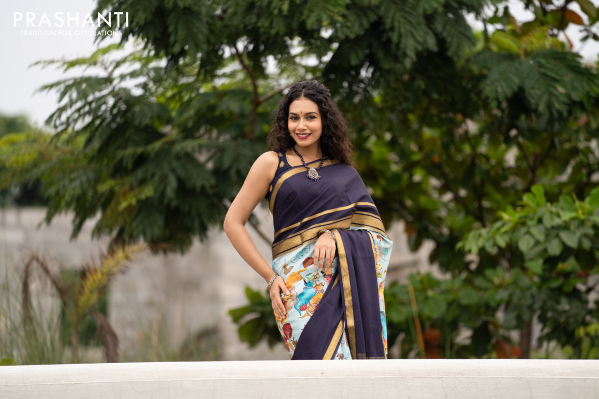 Pure mysore silk saree pastel blue and navy blue with pichwai prints and rettapet zari woven border