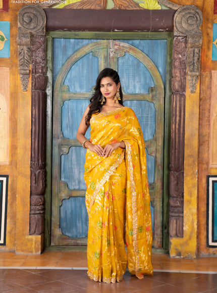 Pure organza silk saree mustard yellow with allover thread & zari weaves and gottapatti lace & mirror work border