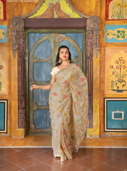 Pure organza silk saree cream with allover thread & zari weaves and gottapatti lace & mirror work border