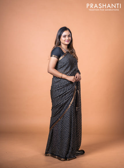 Semi georgette saree black with allover bandhani prints and zari woven border