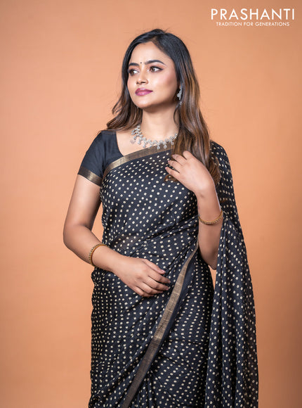 Semi georgette saree black with allover bandhani prints and zari woven border