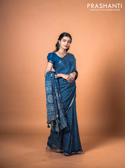 Semi georgette saree peacock blue with allover bandhani prints and zari woven border