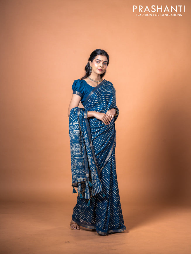 Semi georgette saree peacock blue with allover bandhani prints and zari woven border