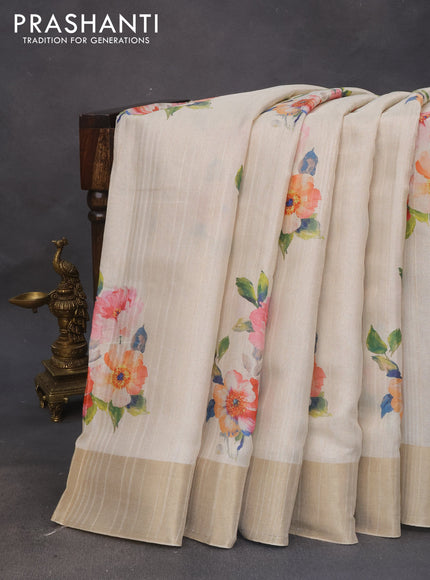 Semi matka tissue saree cream with floral digital prints and zari woven border