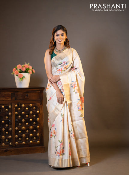 Semi matka tissue saree cream with floral digital prints and zari woven border