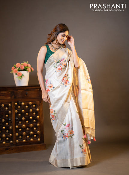 Semi matka tissue saree cream with floral digital prints and zari woven border