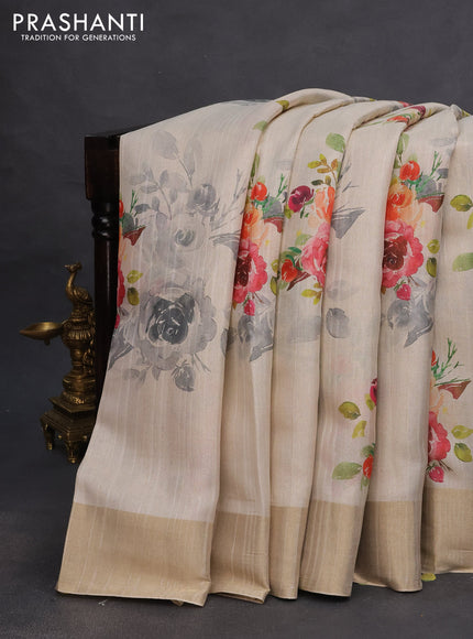 Semi matka tissue saree cream with floral digital prints and zari woven border