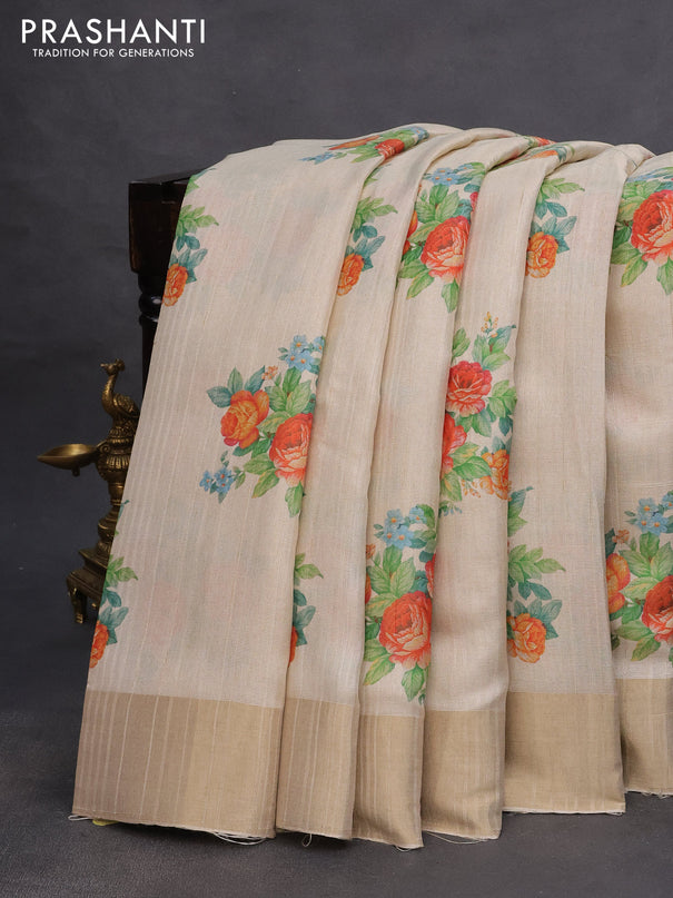 Semi matka tissue saree cream with floral digital prints and zari woven border