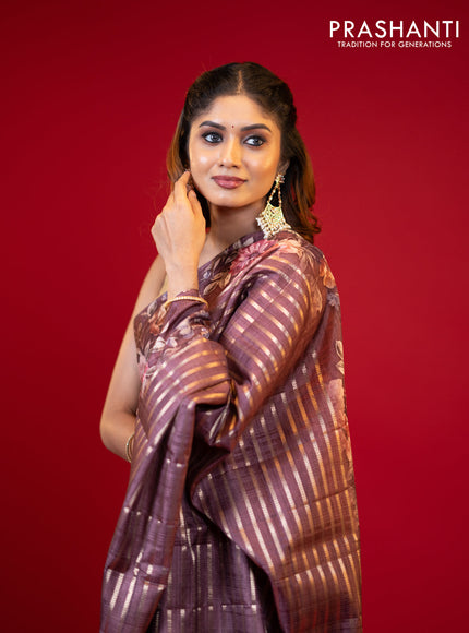 Semi tussar saree brown shade with allover zari woven stripes pattern and floral printed border