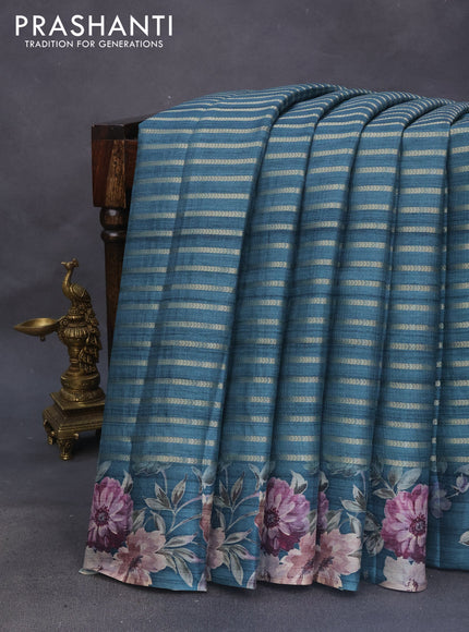 Semi tussar saree peacock green with allover zari woven stripes pattern and floral printed border