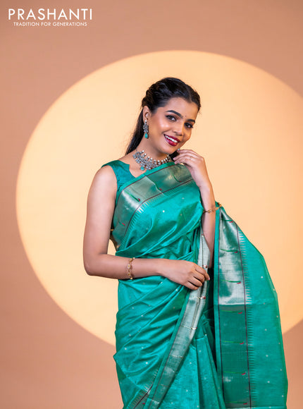 Semi tussar saree teal blue with zari woven buttas & paithani weaves and zari woven muniya butta border