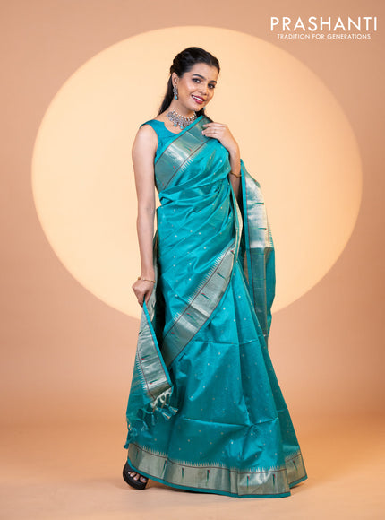 Semi tussar saree teal blue with zari woven buttas & paithani weaves and zari woven muniya butta border