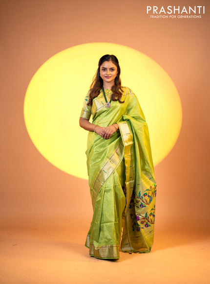 Semi tussar saree fluorescent green with zari woven buttas & paithani weaves and zari woven muniya butta border