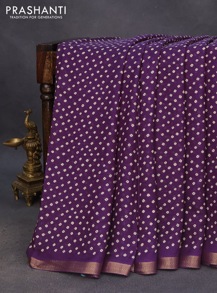 Semi georgette saree violet with allover bandhani prints and zari woven border