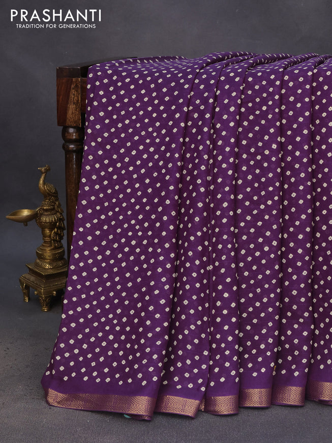 Semi georgette saree violet with allover bandhani prints and zari woven border