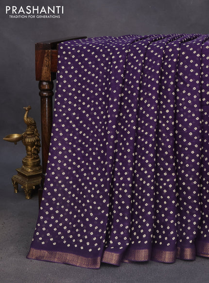 Semi georgette saree deep violet with allover bandhani prints and zari woven border