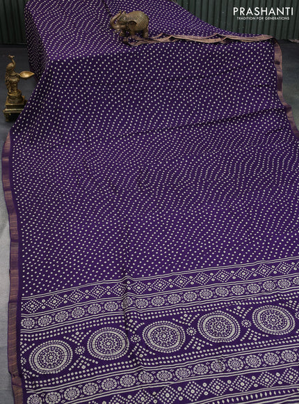 Semi georgette saree deep violet with allover bandhani prints and zari woven border