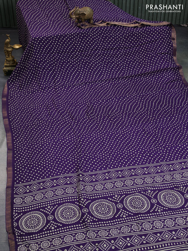 Semi georgette saree deep violet with allover bandhani prints and zari woven border