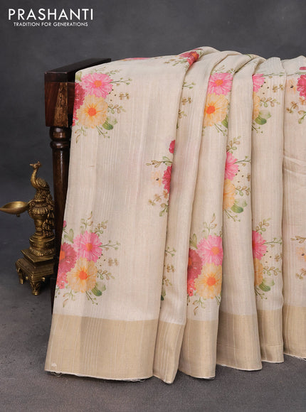 Semi matka tissue saree cream with allover floral digital prints and zari woven border