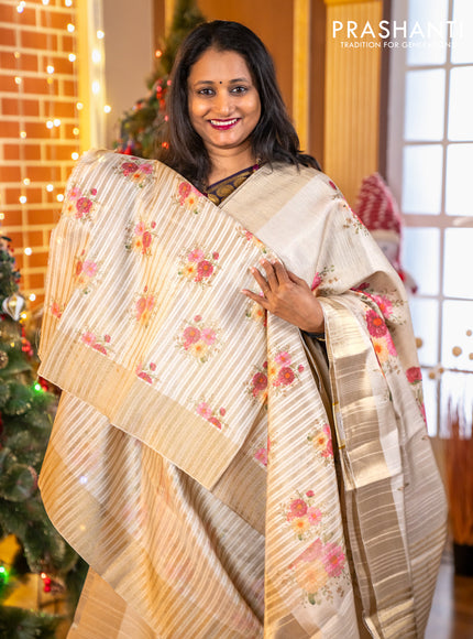 Semi matka tissue saree cream with allover floral digital prints and zari woven border