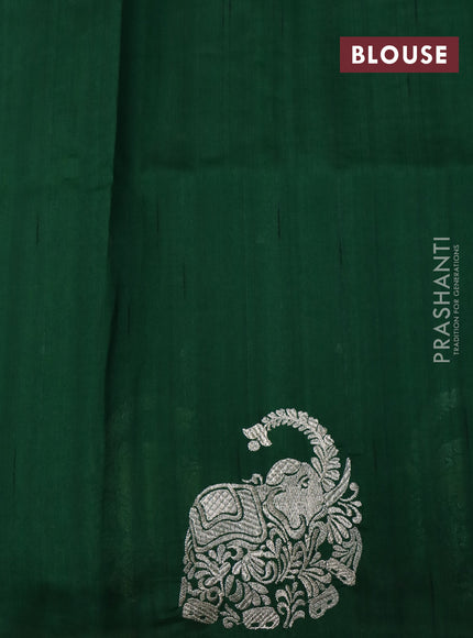 Semi tussar saree green with zari woven buttas and elephant zari woven butta border