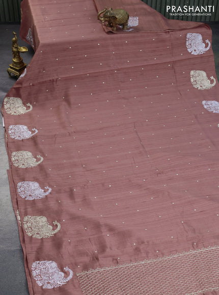 Semi tussar saree pastel brown with zari woven buttas and elephant zari woven butta border