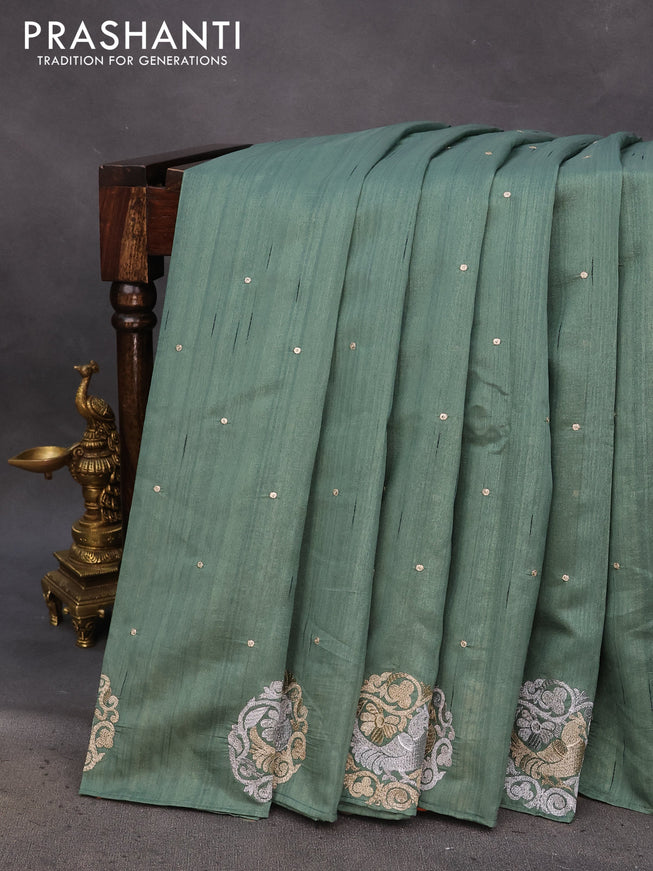 Semi tussar saree pastel green with zari woven buttas and zari woven butta border