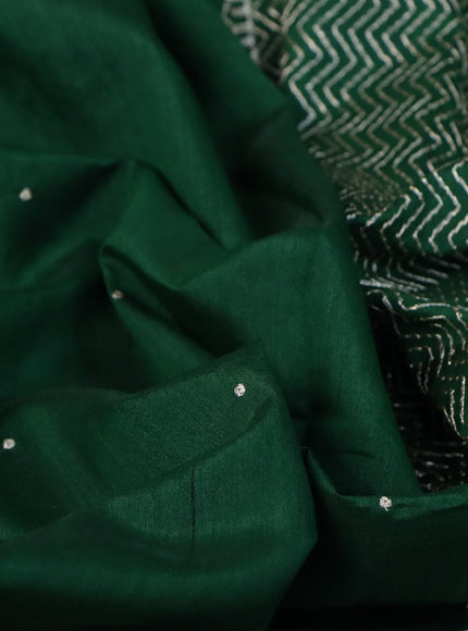 Semi tussar saree green with zari woven buttas and zari woven butta border