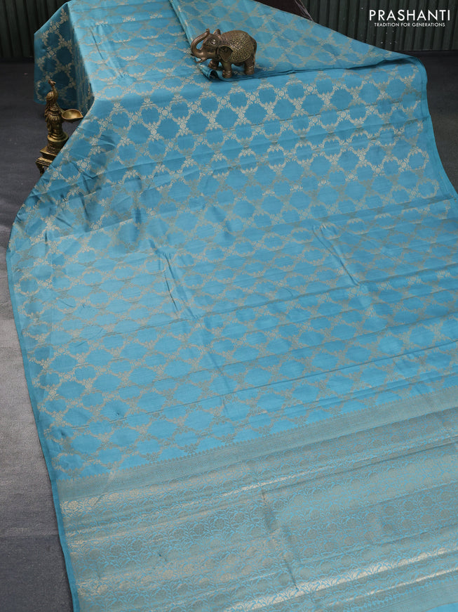 Chiniya silk saree pastel blue with allover zari weaves in borderless style