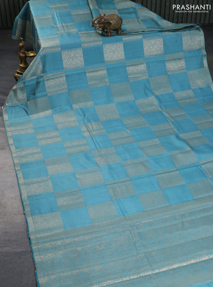 Chiniya silk saree blue shade with allover box type zari weaves and zari woven border