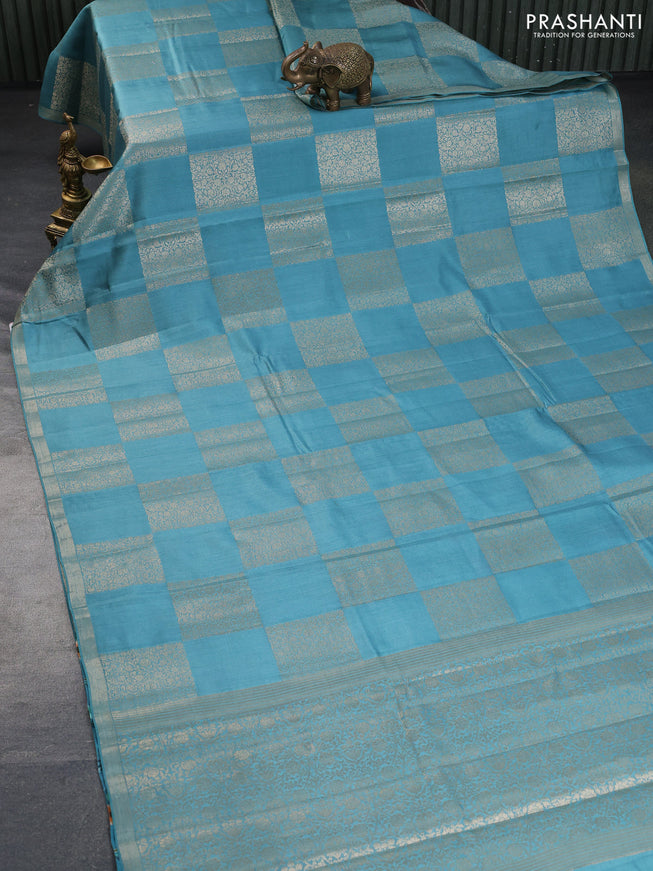 Chiniya silk saree blue shade with allover box type zari weaves and zari woven border