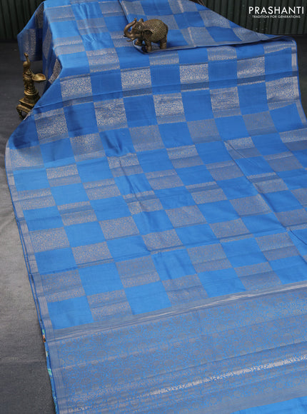 Chiniya silk saree blue with allover box type zari weaves and zari woven border