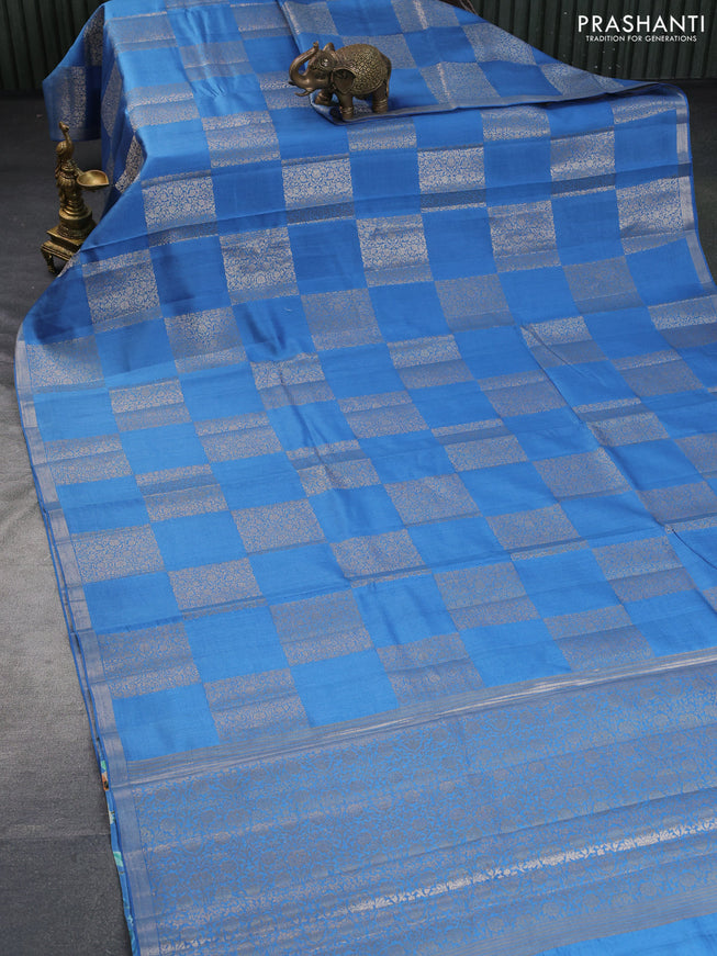 Chiniya silk saree blue with allover box type zari weaves and zari woven border