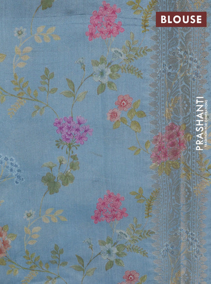 Chiniya silk saree pastel blue shade with allover zari woven butta weaves in borderless style