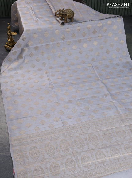 Chiniya silk saree grey with allover zari woven butta weaves in borderless style