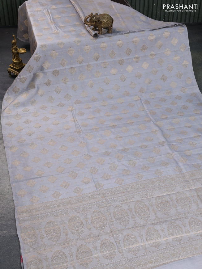 Chiniya silk saree grey with allover zari woven butta weaves in borderless style