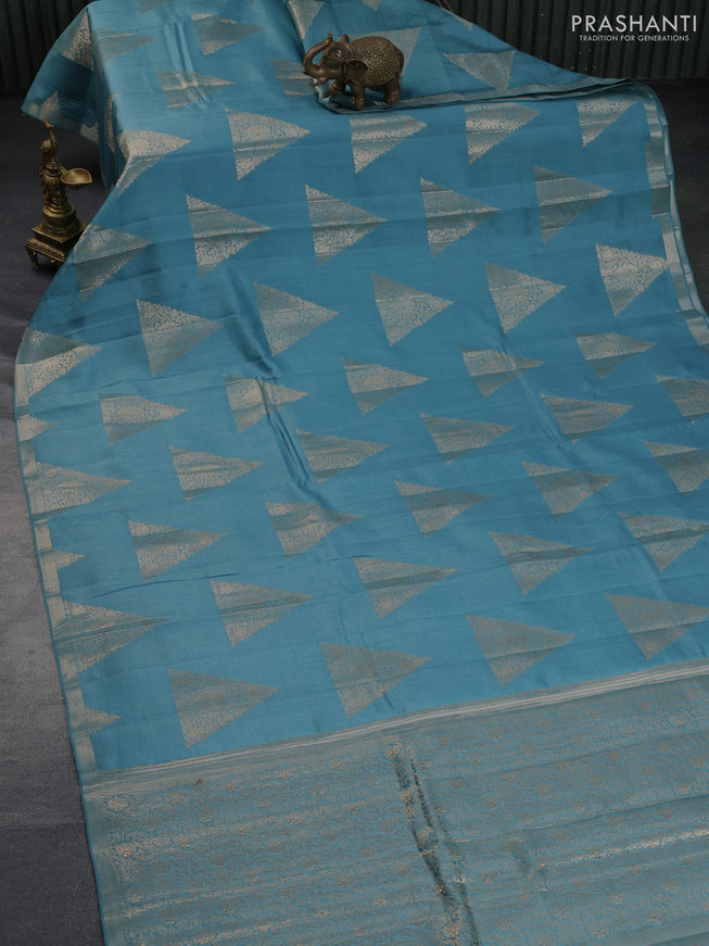 Chiniya silk saree teal blue shade with geometric zari woven buttas and zari woven border