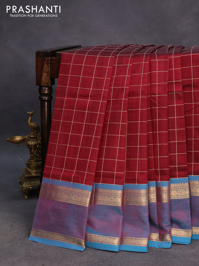 Kanchipuram silk cotton saree maroon and teal blue with allover checked pattern and rettapet zari woven border