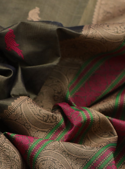 Kanchipuram silk cotton saree dark sap green with thread woven buttas and long thread woven border